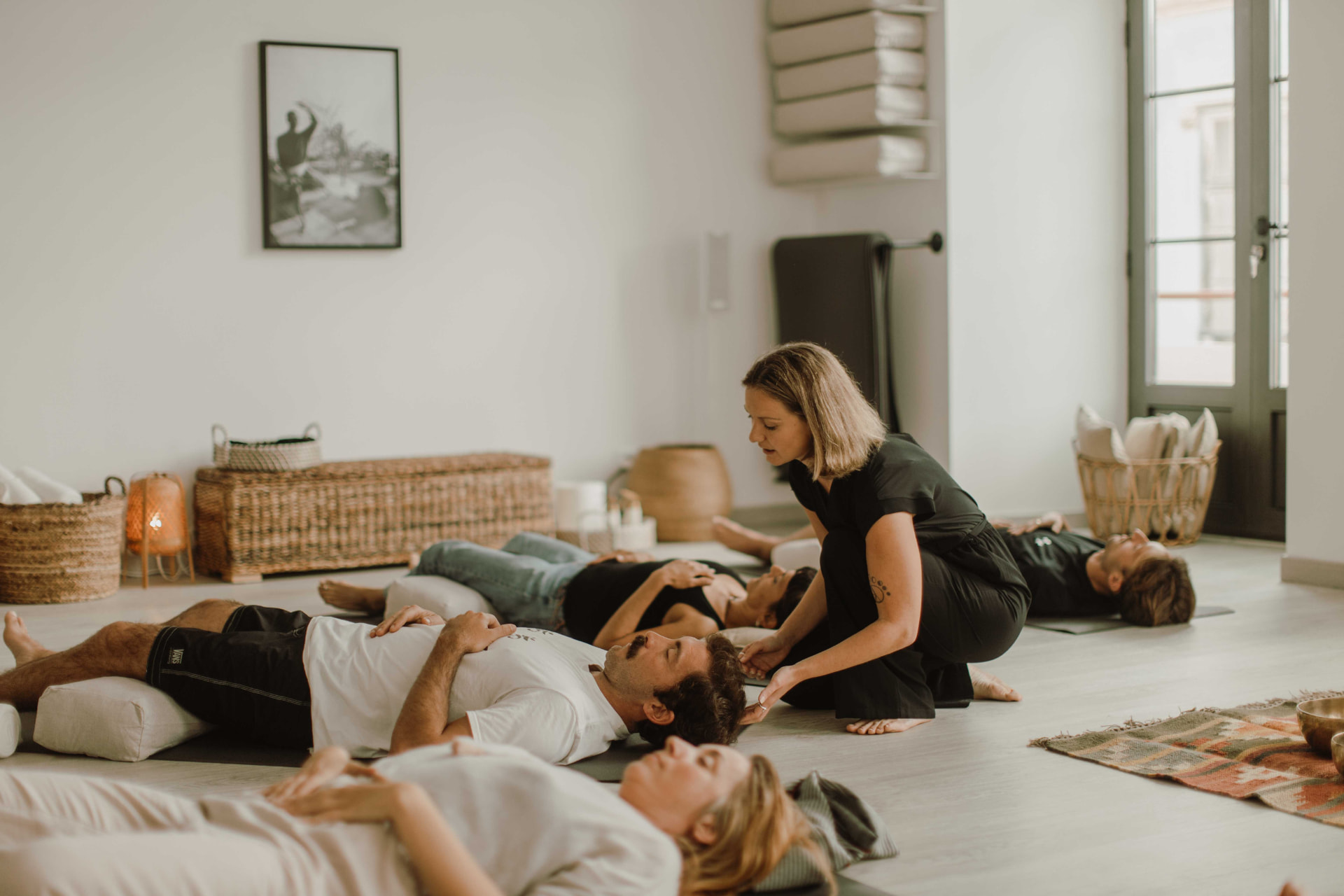 Izabella supporting participants during nervous system breathwork